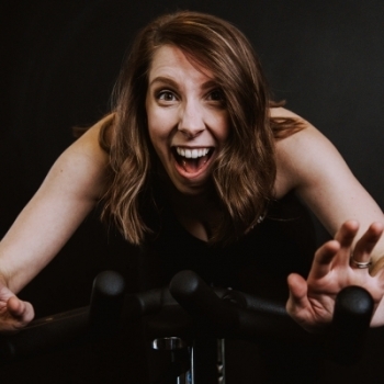 Kelly posing on bike